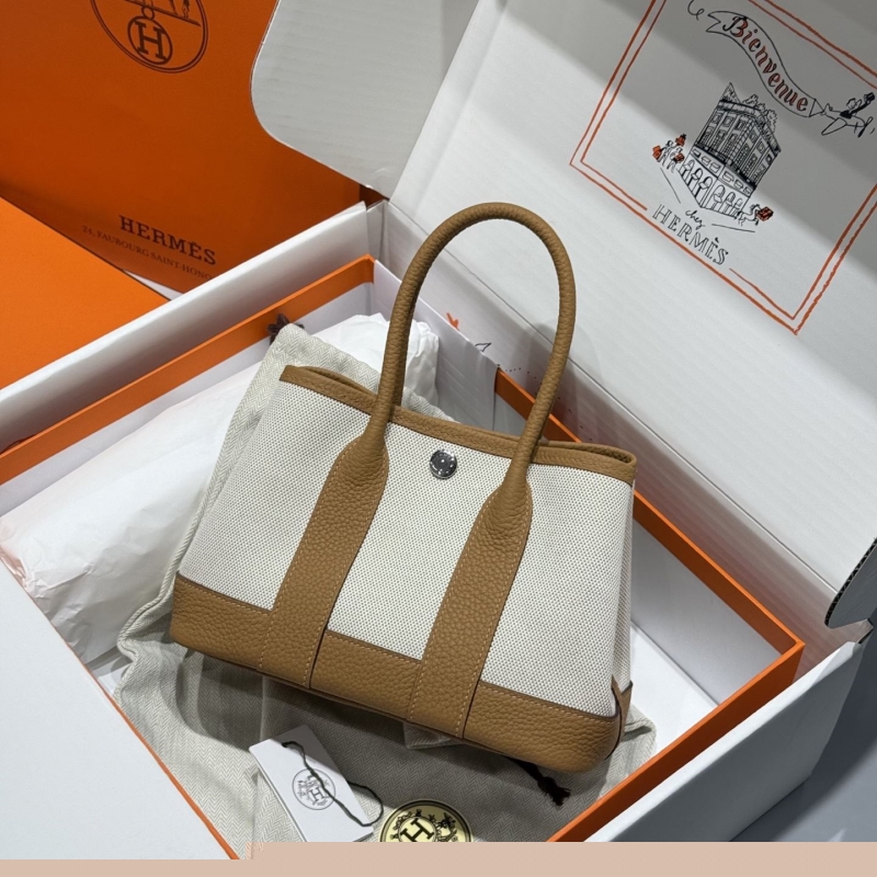 H**mes shopping bags